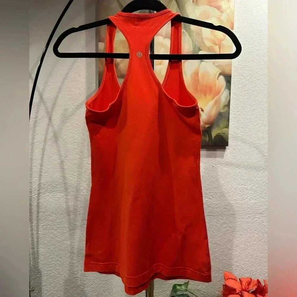 Lululemon Athletica orange tank tops size 4